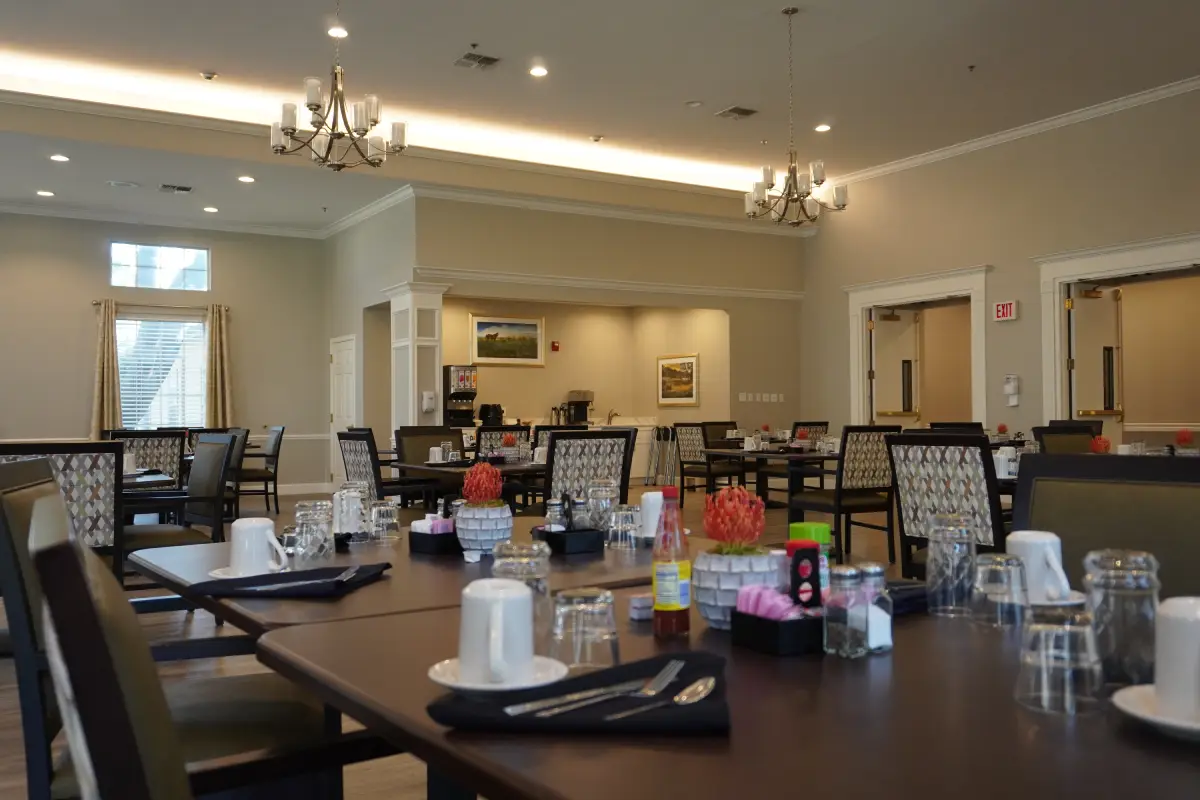 The restaurant-style dining room at Sodalis Austin, set for a meal