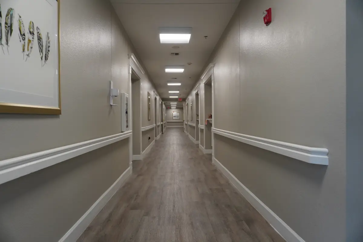 A wide, well lit hallway inside Sodalis Austin